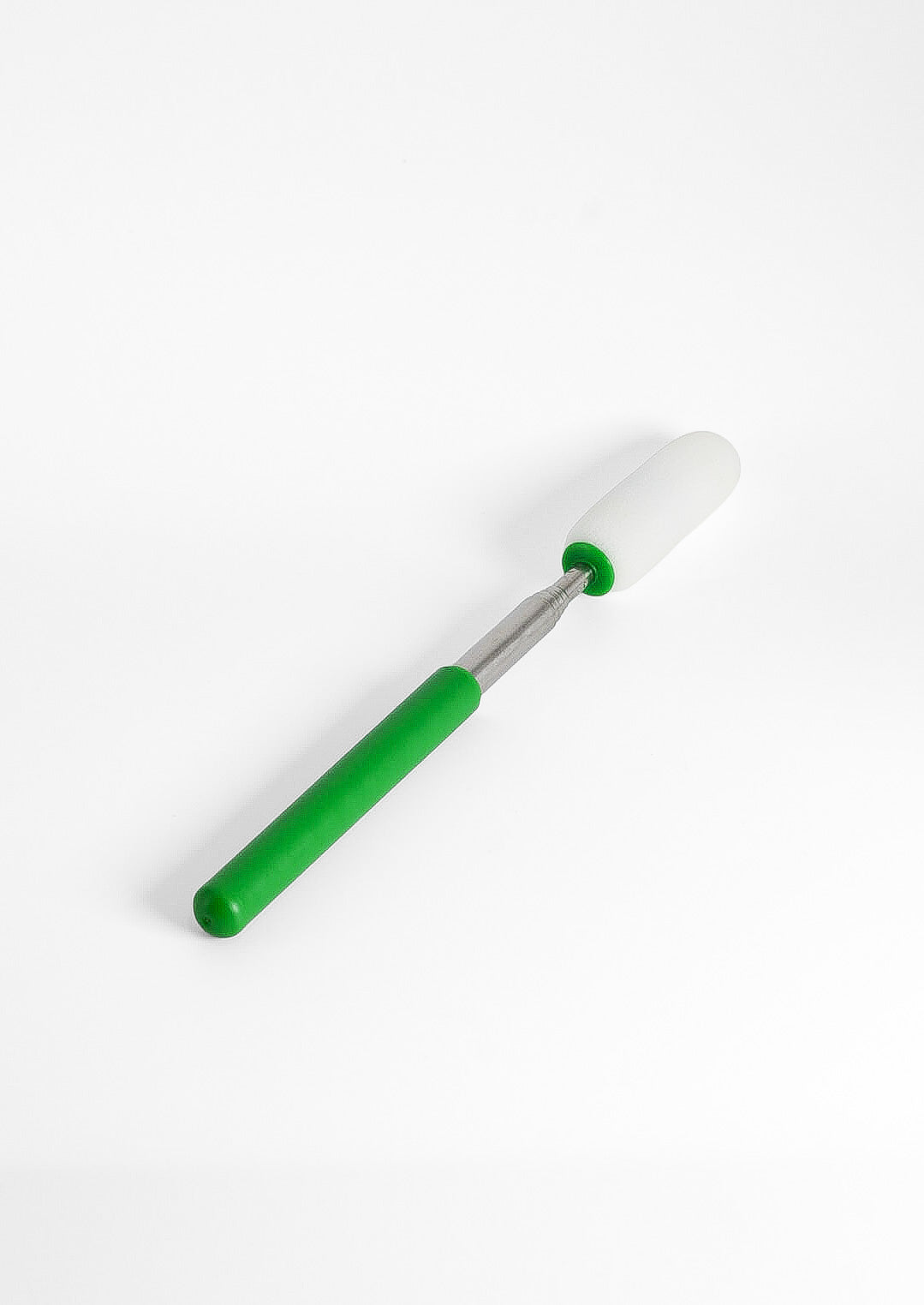 Telescopic sponge on a stick laid flat with the shaft closed, showing its shortest length