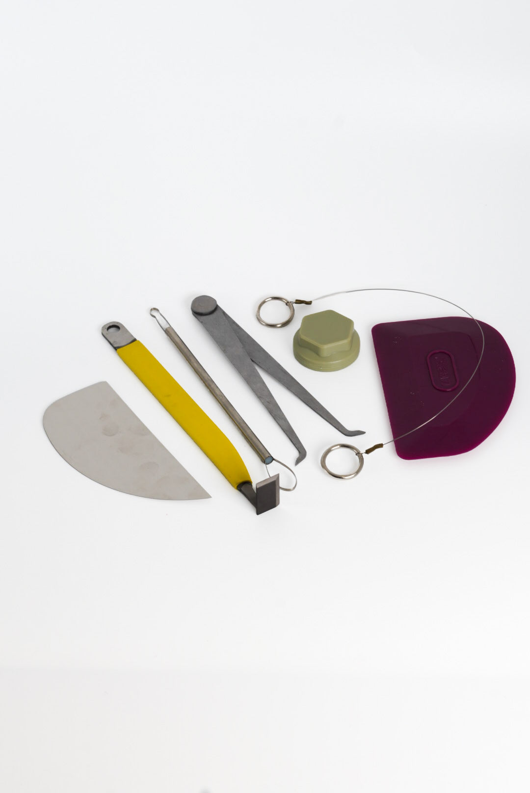 The GLOST Advanced Throwing Set with the khaki canvas tool roll.