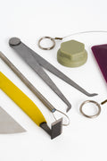 Close view of the Advanced Throwing Set tools.