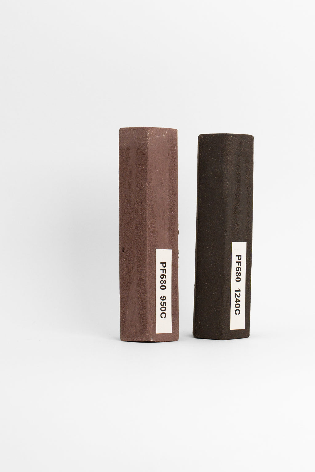 Professional Smooth Black PF680 test tiles, fired at 950C and 1240C