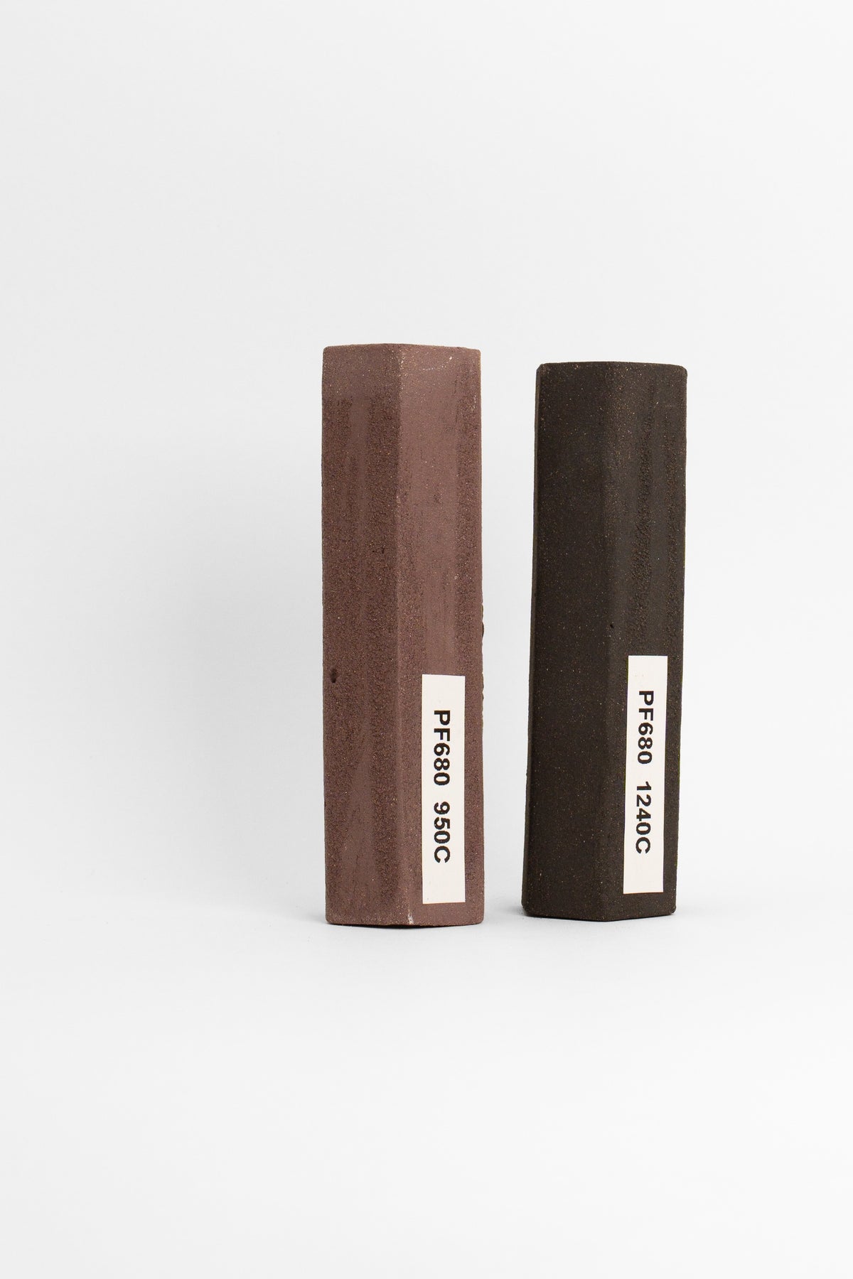 Professional Smooth Black PF680 test tiles, fired at 950C and 1240C