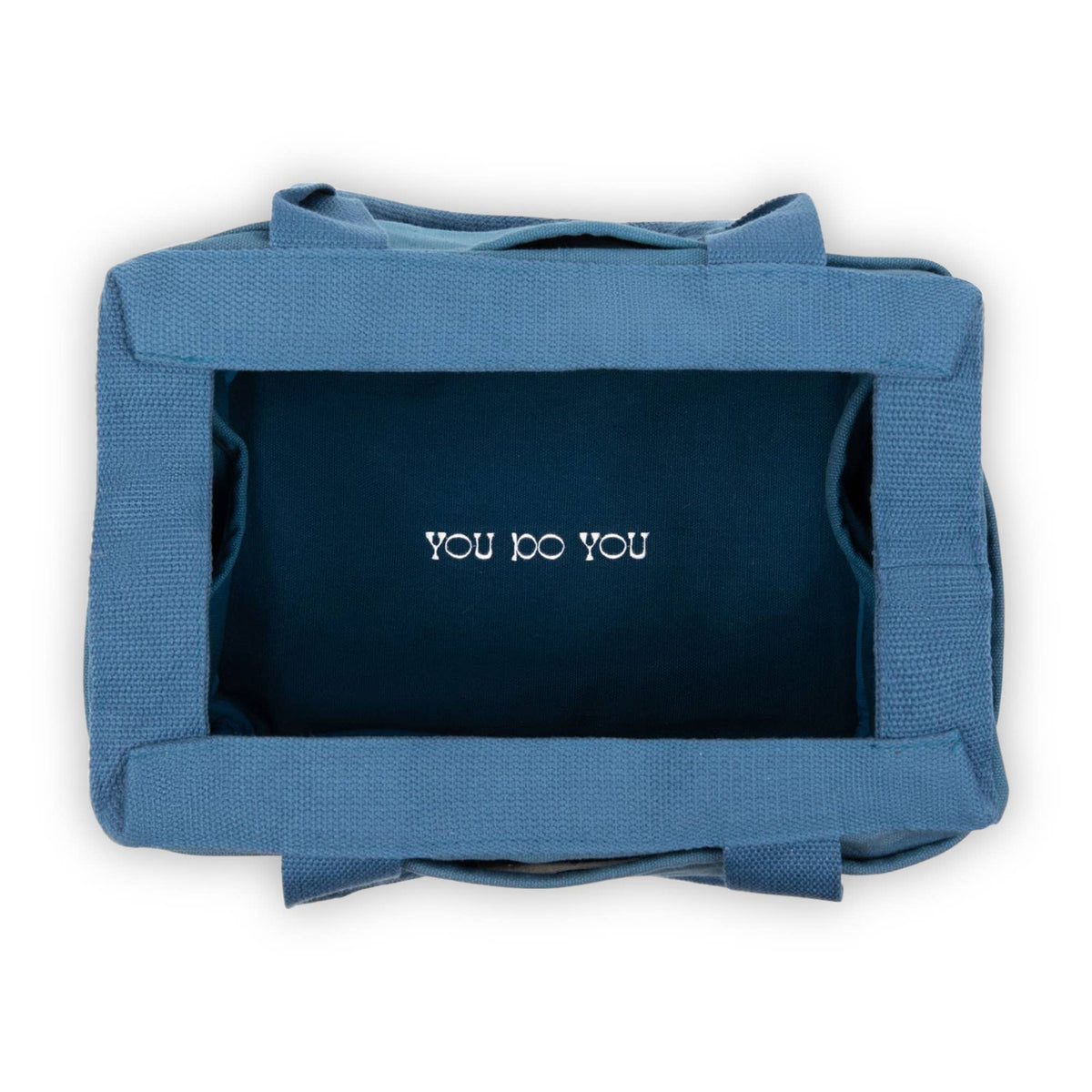 Blue bag with 'YOU DO YOU' text on a white background